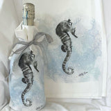 two seahorse towels 